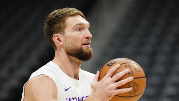 Feb 14, 2024; Denver, Colorado, USA; Sacramento Kings forward Domantas Sabonis (10) warms up before the game against the Denver Nuggets at Ball Arena. Mandatory Credit: Ron Chenoy-USA TODAY Sports  